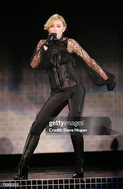 Pop icon Madonna performs on stage on the first night of her 'Confessions' World Tour at The Forum on May 21, 2006 in Los Angeles, California. The...