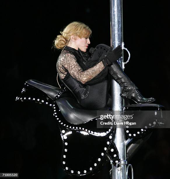 Pop icon Madonna performs on stage on the first night of her 'Confessions' World Tour at The Forum on May 21, 2006 in Los Angeles, California. The...