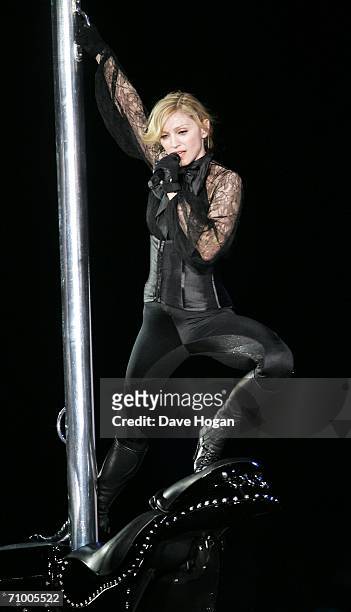 Pop icon Madonna performs on stage on the first night of her 'Confessions' World Tour at The Forum on May 21, 2006 in Inglewood, California. The...