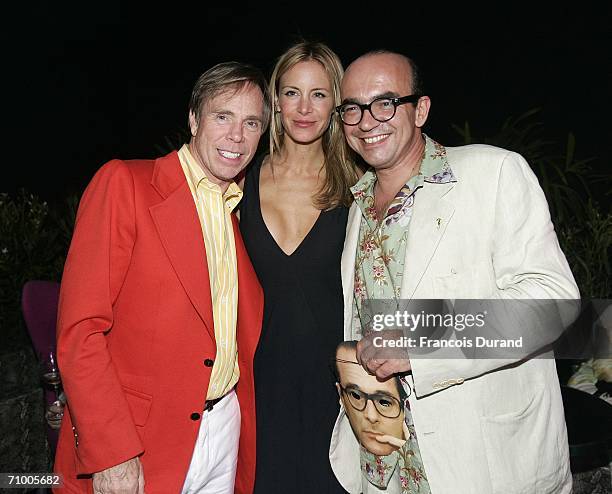 Director Karl Zero , fashion designer Tommy Hilfiger and an unidentified guest attend the party for the film 'Dans la Peau de Jacques Chirac' at the...