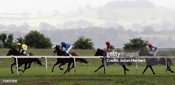 Runners head down the back straight during The Vic & Jan Johnson 14TH Anniversary Fillies Handicap Stakes Race run at Bath Racecourse on May 22, 2006...