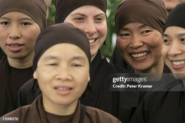 The cast attend a photocall promoting the film 'Buddha' during the 59th International Cannes Film Festival on May 22, 2006 in Cannes, France.
