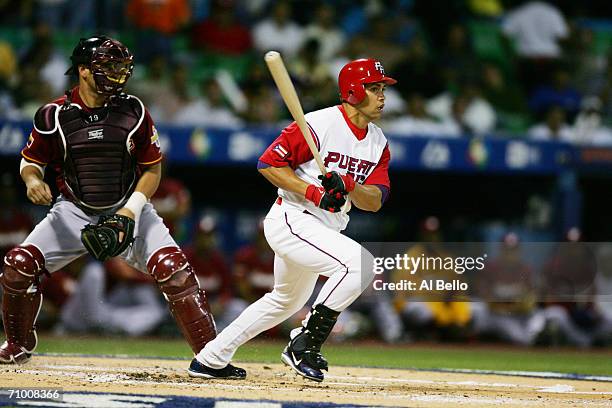 Carlos Beltran of Puerto Rico bats against Venezuela in the second round of the World Baseball Classic at Hiram Bithorn Stadium on March 13, 2006 in...