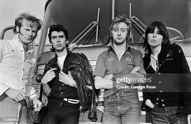 The British rock band The Pretenders pose in front of their tour bus during their first American 1980 concert tour stop in Nashville, Tennessee. By...