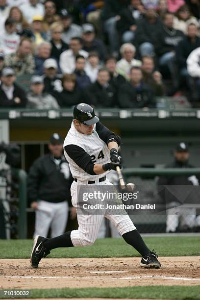 Infielder Joe Crede of the Chicago White Sox connects with a Chicago Cubs pitch on May 19, 2006 at U.S. Cellular Field in Chicago, Illinois. The...