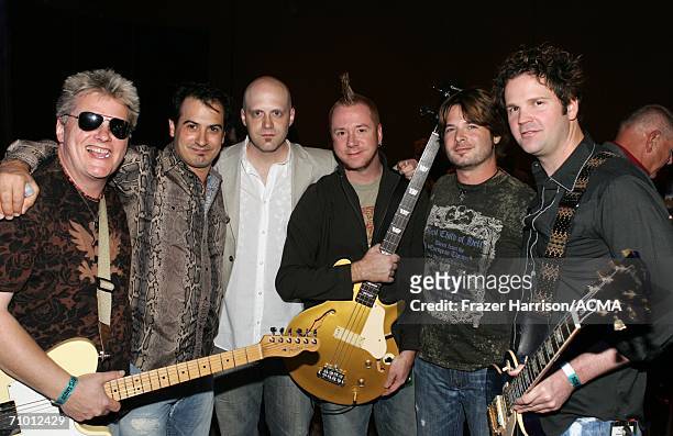 Musicians Scotty Wray, Ron D'Argenio, Jerry Flowers, Aden Bubeck, Keith Zebroski and Alex Weeden pose backstage during the Academy Of Country Music...