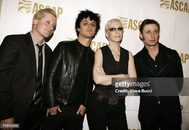 Members of the band Green Day Tre Cool, Billy Joe Armstrong and Mike Dirnt, pose with Annie Lennox at the 23rd Annual ASCAP Pop Music Awards on May...