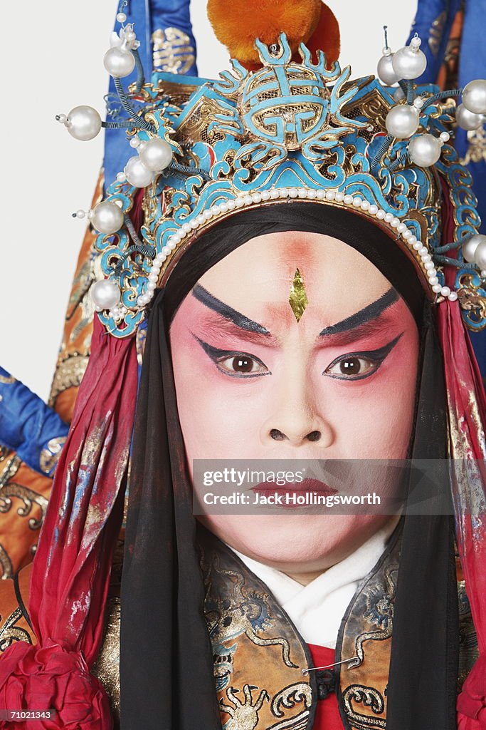 Portrait of a male Chinese opera performer looking serious