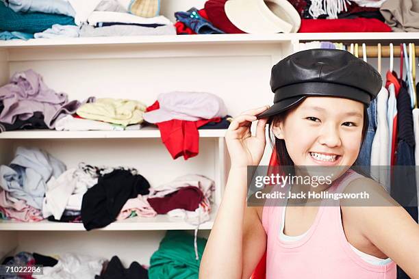 portrait of a girl wearing a cap - closet one girl only stock pictures, royalty-free photos & images