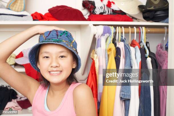 portrait of a girl wearing a hat - closet one girl only stock pictures, royalty-free photos & images