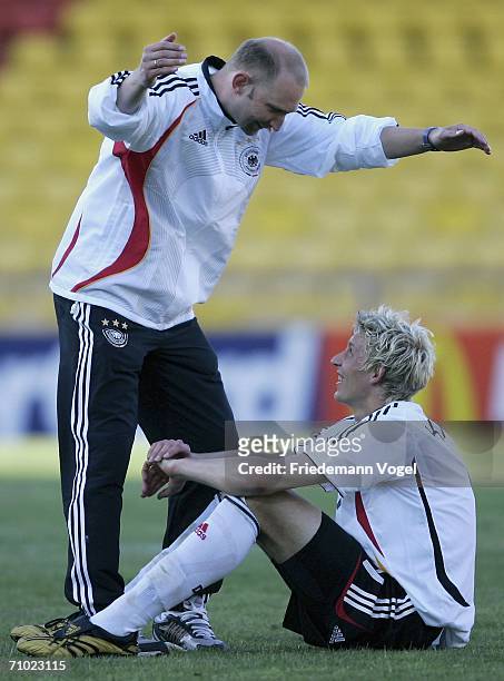 Coach Dieter Eilts and Stefan Kiesling of Germany celebrate after winning the UEFA U21's Championship Group A match between Serbia & Montenegro and...