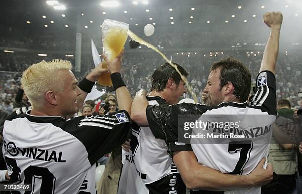 Christian Zeitz, Kim Andersson and Vid Kavticnik of Kiel celebrate winning the Handball Bundesliga match between THW Kiel and TBV Lemgo at the Ostsee...