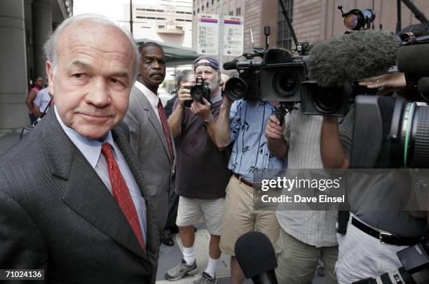 Former Enron chairman Kenneth Lay listens to a question outside of the Bob Casey U.S. Courthouse after the close of his bank fraud trial May 23, 2006...