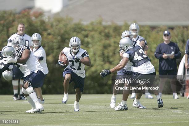 Running back Keylon Kincade runs with the ball during the Dallas Cowboys Mini Camp on May 5, 2006 in Irving, Texas.