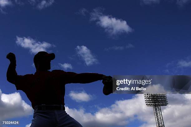 Jason Varitek of the Boston Red Sox warms up before the game against the New York Yankees on May 23, 2006 at Fenway Park in Boston, Massachusetts.