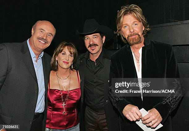 Television host Dr. Phil McGraw, wife Robin and Kix Brooks and Ronnie Dunn of Brooks & Dunn pose backstage during the 41st Annual Academy Of Country...