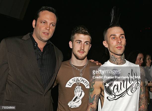 Drummer Travis Barker poses with actor Vince Vaughn and Jordan McGraw backstage during the 41st Annual Academy Of Country Music Awards held at the...
