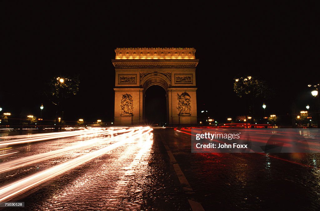 France, Paris, Arc de Triomphe at night (long exposure)