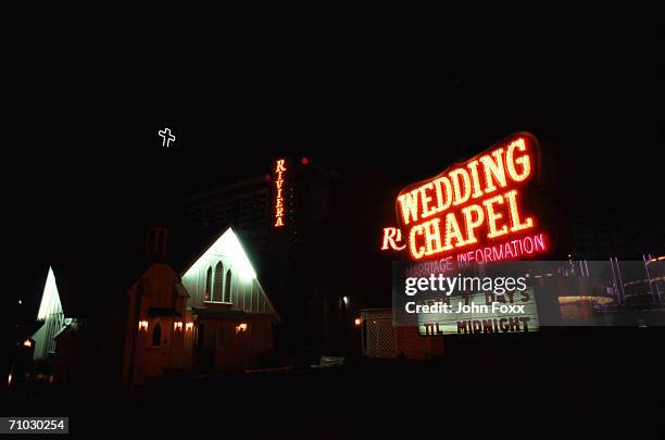 usa, nevada, las vegas, wedding chapel illuminated at night - las vegas wedding ストックフォトと画像