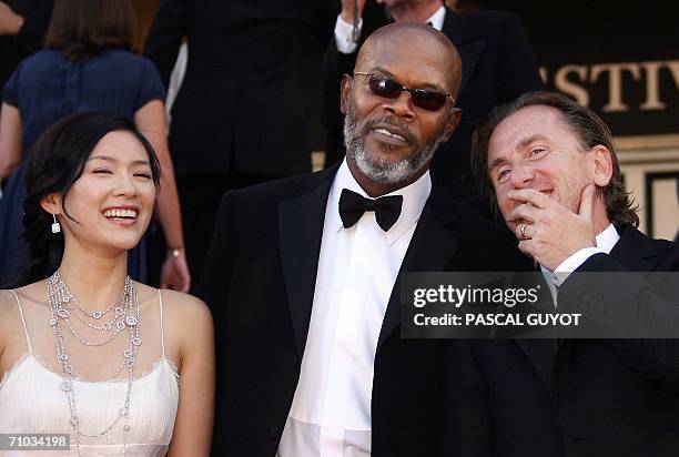 Members of the Jury Chinese actress Zhang Ziyi, US actor Samuel L.Jackson and British actor Tim Roth pose upon arriving at the Festival Palace to...