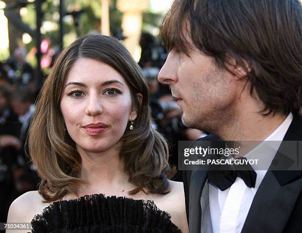 Director Sofia Coppola and her companion Phoenix singer Thomas Mars arrive at the Festival Palace to attend the premiere of the film 'Marie...