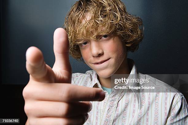 portrait of a teenage boy - arrogancia fotografías e imágenes de stock