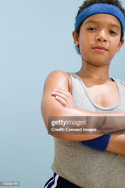 boy perspiring wearing sports clothing - sweat band stock pictures, royalty-free photos & images