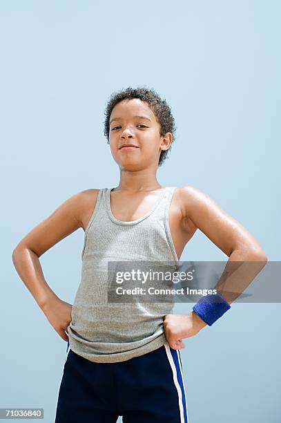 boy perspiring wearing sports clothing - hand on hip stock pictures, royalty-free photos & images