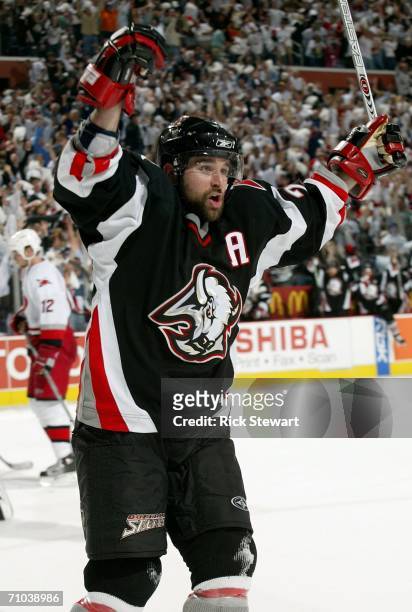 Chris Drury of the Buffalo Sabres celebrates a goal by teammate Ales Kotalik in the second period of game three of the Eastern Conference Finals...