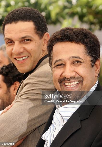 Actor Sami Bouajila and singer Khaled attend a photocall promoting the film 'Indigenes' at the Palais des Festivals during the 59th International...