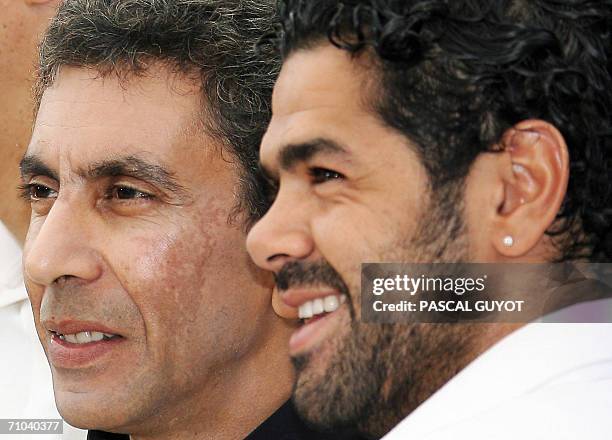 French director Rachid Bouchareb and actor Jamel Debbouze pose during a photocall for their film 'Indigenes' at the 59th edition of the International...