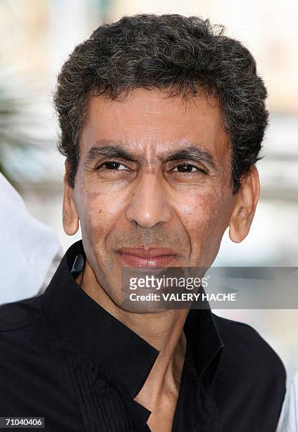 French director Rachid Bouchareb poses during a photocall for his film 'Indigenes' at the 59th edition of the International Cannes Film Festival in...