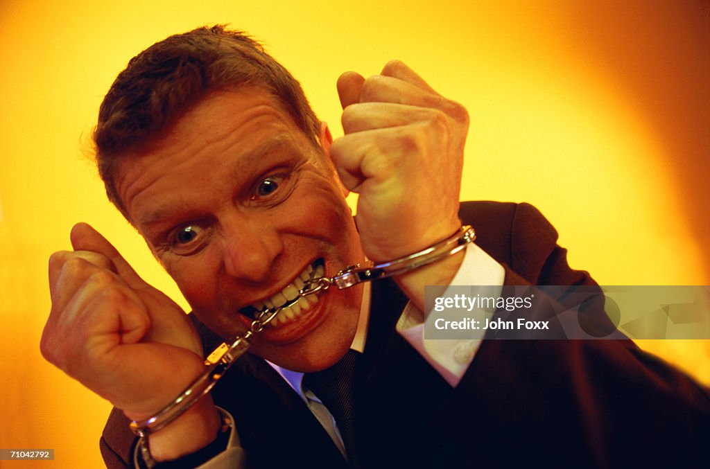 Chained businessman