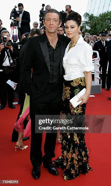 Member of the Jury Italian actress Monica Bellucci and her companion French actor Vincent Casel attends the 'Indigenes' premiere during the 59th...