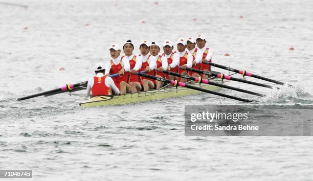 Na Zheng, Cuiping Yang, Yanhua Gao, Xiaoxia Yan, You Wu, Suli Mu, Ran Cheng, Xiuhua Luo and Fei Yu of China in action during their women's eight heat...
