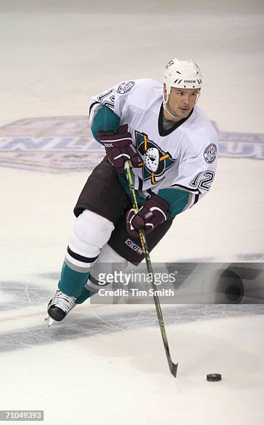 Left wing Jeff Friesen of the Mighty Ducks of Anaheim controls the puck against the Edmonton Oilers in game three of the NHL Western Conference...