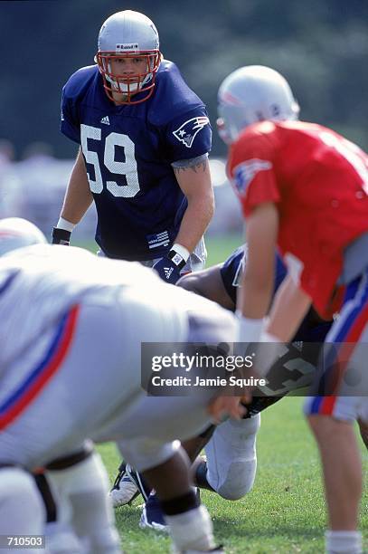 Andy Katzenmoyer of the New England Patriots waits for the hike during the Patriots Training Camp at Bryant College in Smithfield, Rhode...