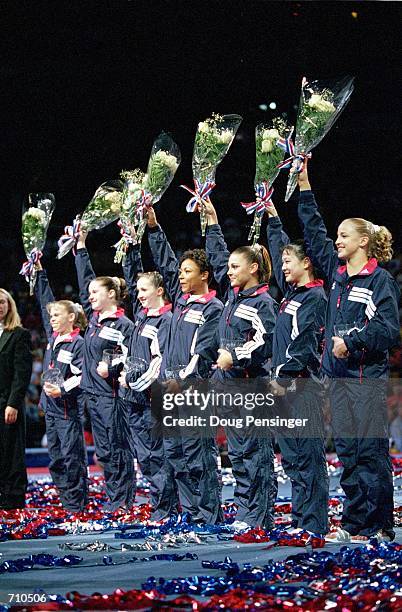 From Morgan White, Jamie Dantzscher, Kristen Maloney, Dominique Dawes, Elise Ray, Amy Chow and Alternate Alyssa Beckerman celebrate as they are named...