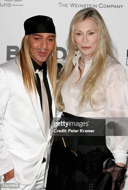 Designer John Galliano and US actress Faye Dunaway arrive at "Cinema Against AIDS 2006", the annual event in aid of amfAR at Le Moulin de Mougins...