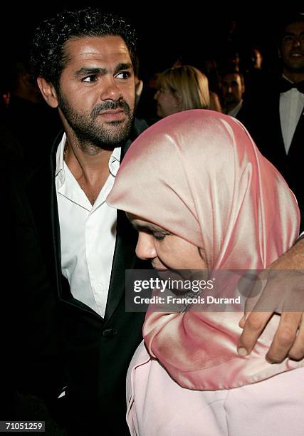 Actor Jamel Debbouze and his mother departs from 'Indigenes' premiere during the 59th International Cannes Film Festival May 25, 2006 in Cannes,...