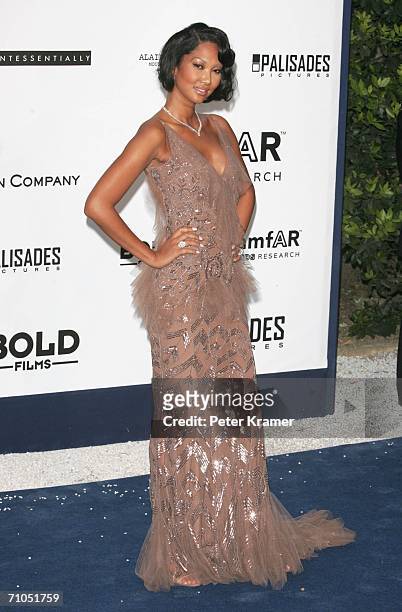 Model Kimora Lee Simmons arrives at "Cinema Against AIDS 2006", the annual event in aid of amfAR at Le Moulin de Mougins during the 59th...