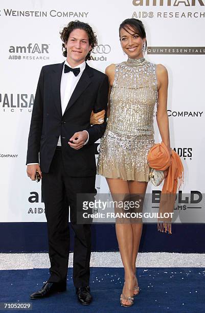 Actress Carmen Chaplin and a guest arrive to attend the amfAR?s annual "Cinema Against AIDS 2006" event at Le Moulin de Mougins during the 59th...