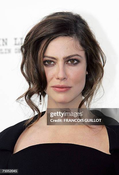 French actress Anna Mouglalis arrives to attend the amfAR?s annual "Cinema Against AIDS 2006" event at Le Moulin de Mougins during the 59th...