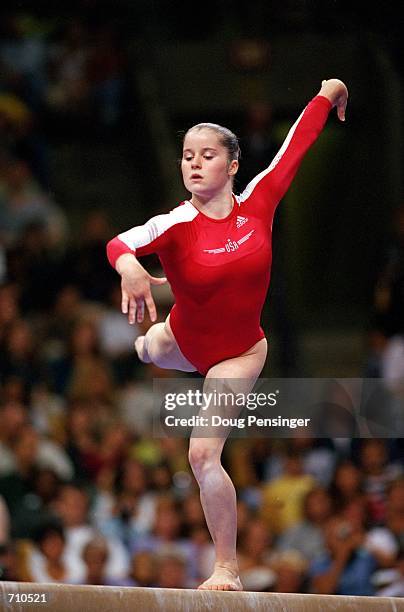 Elise Ray is doing her routine in the Balance Beam Event during the U.S. Women's Olympic Gymnastics Trials at the Fleet Center in Boston,...