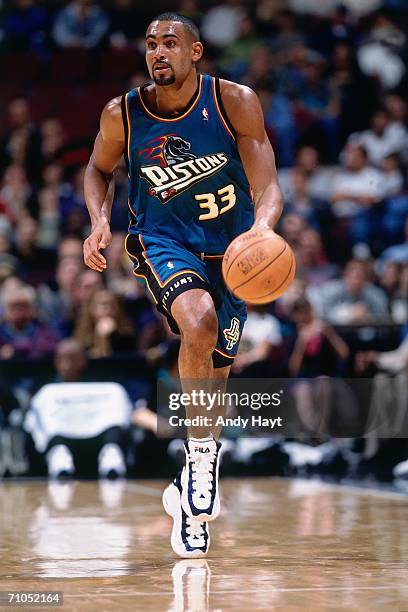 Grant Hill of the Detroit Pistons drives the ball up court during a game against the Vancouver Grizzlies at General Motors Palace on November 9, 1997...