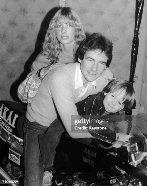 English motorcycle racer Barry Sheene on his new Yamaha TZ500 bike with his fiancee Stephanie McLean and his nephew Scott Smart, 9th January 1980.