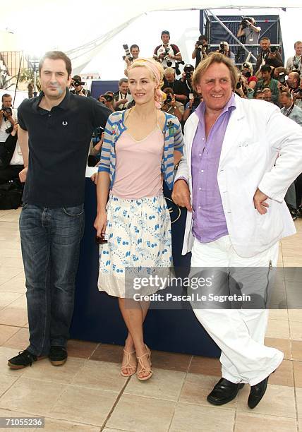 Director Xavier Giannoli, actors Gerard Depardieu and Cecile De France attend the ''Quand J'etais Chanteur' photocall during the 59th International...