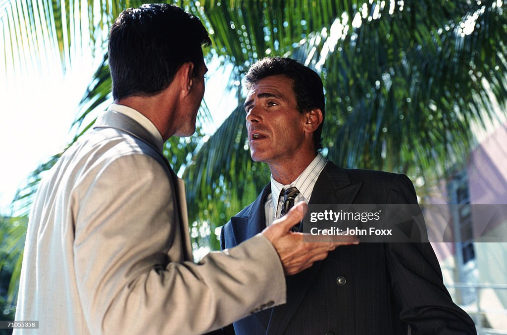 Businessmen arguing