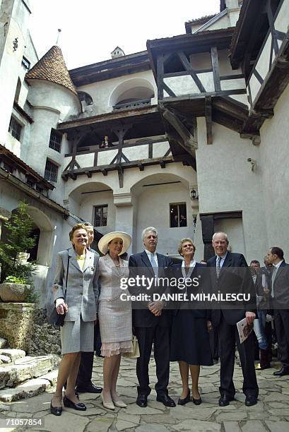Dominic of Habsburg , a New York architect and other members of his family pose for the media in the courtyard of the Bran Castle, known as Dracula...
