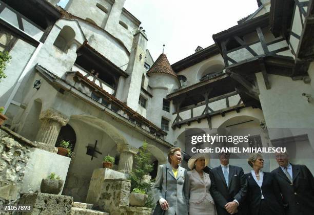 Dominic of Habsburg , a New York architect, and members of his family pose for a picture in the courtyard of the Bran Castle, known as Dracula...
